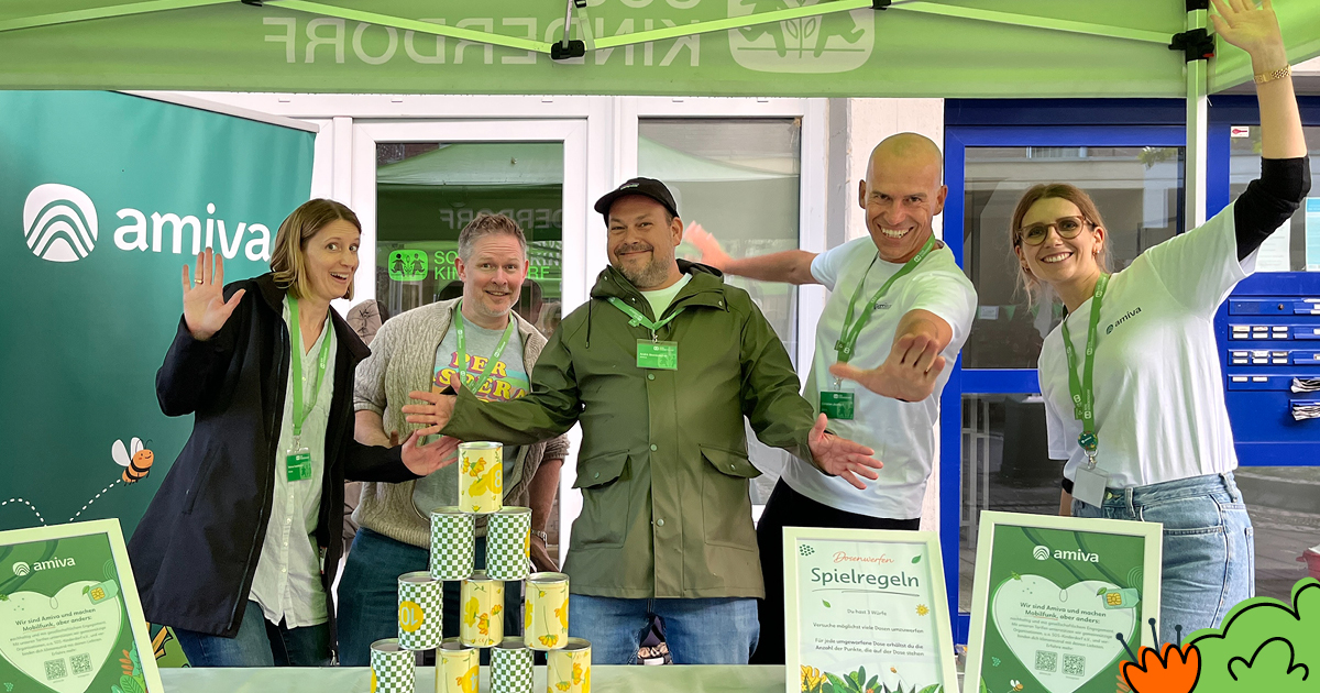 Das Amiva-Team am Dosenwerfstand auf dem Familienfest von SOS-Kinderdorf Düsseldorf