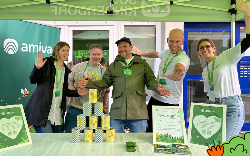 Das Amiva-Team am Dosenwerfstand auf dem Familienfest von SOS-Kinderdorf Düsseldorf
